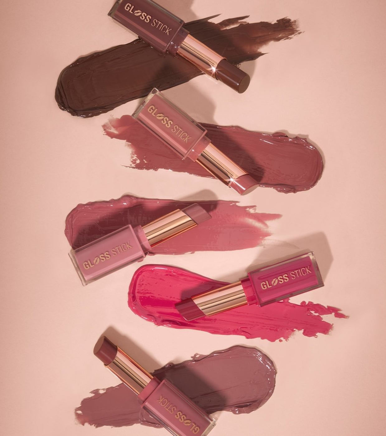 Makeup Revolution - Barra de labios Pout Lip Gloss Stick - Sugar Cookie Pink